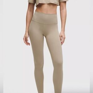 Lululemon Wunder Train High-Rise Tight 25''
size 4 Sheer Oak